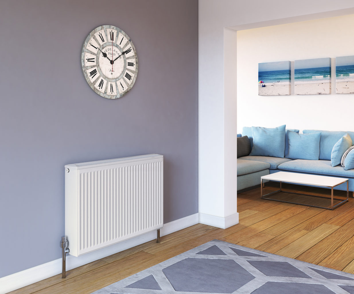 Stelrad Softline Compact K3 against a purple wall in a living room